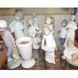 Assorted Lladro and Nao figures including Choristers,