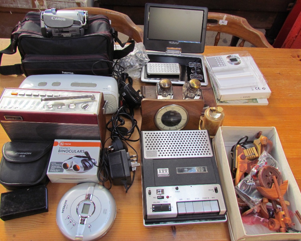 A Canon video camera together with two Roberts radios, Ikasu portable DVD player, ITT recorder,