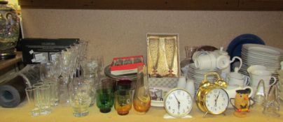 An Led Light box together with drinking glasses, part tea sets, clocks, pipes, Classical CD's,