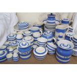 A collection of T G Green Cornishwares including storage jars, plates, bowls, cruets,