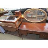 An Edwardian mahogany dressing table together with a teak gate leg dining table, a gilt wall mirror,