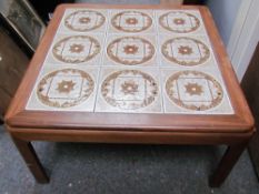 A teak tile top table