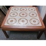 A teak tile top table