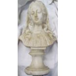 An alabaster bust of a maiden on a socle base