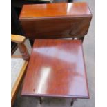 An Edwardian mahogany Sutherland table together with a mahogany coffee table