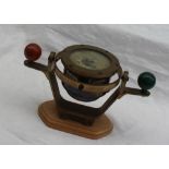 A 20th Century desk model of a brass compass binnacle the card with makers Bergen Nautik, Bergen,