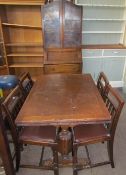 A 20th century oak draw leaf dining table,