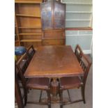 A 20th century oak draw leaf dining table,