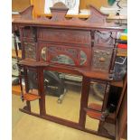 An Art Nouveau overmantel mirror with shelves