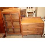 A satin walnut dressing chest together with a pine display cabinet