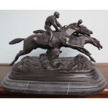 After E Loiscay A bronze model of two race horses on a marble base