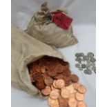 Two bags of uncirculated pennies, one 1967, the other with a lead seal and label dated 28 Oct.