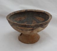 A Chinese Neolithic period primitive pottery bowl, with a flared bowl,