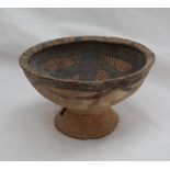 A Chinese Neolithic period primitive pottery bowl, with a flared bowl,