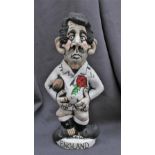 A John Hughes pottery large Grogg of an England player with No.