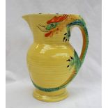 A Burleigh ware pottery jug, with a moulded dragon handle to a yellow ground, printed mark,