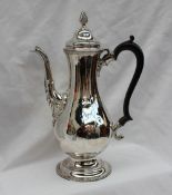 A George III silver coffee pot,