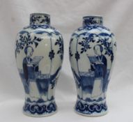 A pair of Chinese blue and white porcelain vases of inverted baluster form,