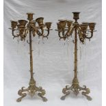 A pair of 19th century French ormolu candelabra, with six branches with leaf decoration,