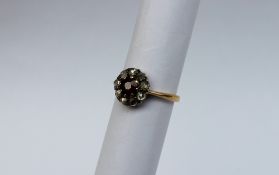 A ruby and diamond cluster ring,