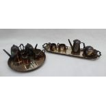 An Elizabeth II silver miniature five piece tea set, comprising a twin handled tray, hot water pot,