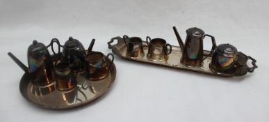 An Elizabeth II silver miniature five piece tea set, comprising a twin handled tray, hot water pot,