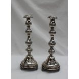 A pair of George V Judaic silver candlesticks,