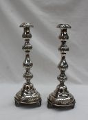 A pair of George V Judaic silver candlesticks,