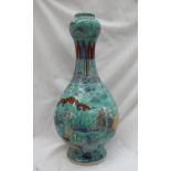 A Chinese porcelain double gourd vase with a turquoise ground, with figures,
