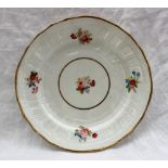 A Swansea porcelain plate of circular form, with a basket weave and swirling decoration,