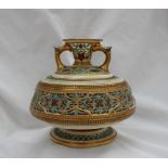 A Royal Worcester reticulated Persian style twin handled vase, in two sections,