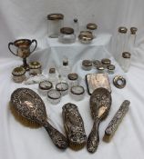 Assorted silver backed dressing table items including clothes brushes, pin cushions,