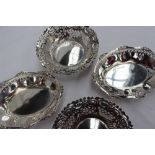 A pair of George V silver bon bon dishes of oval form with a pierced border, Birmingham, 1912,