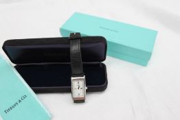 A Tiffany and Co stainless steel wristwatch, the rectangular dial with Roman numerals,