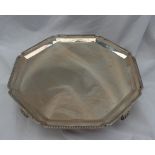 A George VI silver salver, of octagonal form with a beaded edge on four square legs, Sheffield,