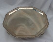 A George VI silver salver, of octagonal form with a beaded edge on four square legs, Sheffield,