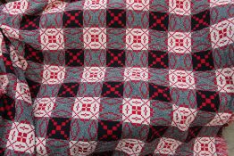 A Welsh blanket in red,