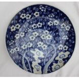 A Chinese porcelain charger decorated in the prunus blossom pattern,