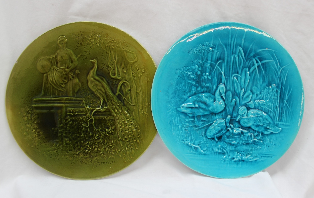 A Burmantofts Faience plate depicting ducks and a turtle, signed P Mallet in turquoise, 27.