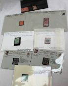 An assortment of mounted stamps including 1911 10d, 1911 4d, 1911 1/2d, 1911 1 shilling, 1902 4d,