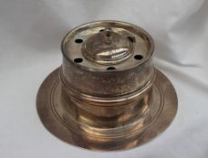 A George V silver desk inkwell, with a domed cover and pen holes,
