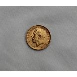 A George V gold half sovereign,