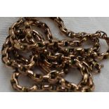 A 9ct yellow gold chain with oval links and a barrel clasp marked 9ct,
