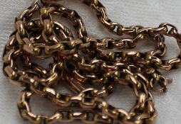 A 9ct yellow gold chain with oval links and a barrel clasp marked 9ct,