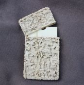 A Cantonese Ivory card case, carved with figures, pagodas and trees, 9.5 x 5.5 x 1.