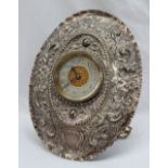 A late Victorian silver cased travelling strut back clock,