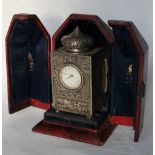 A late Victorian silver carriage clock,