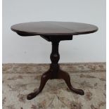 A George III mahogany tripod table,