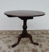 A George III mahogany tripod table,