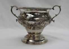 A George V Judaic silver twin handled pedestal bowl, decorated with swags and flowerheads, London,